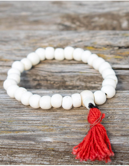 mala-pulsera-hueso-blanca-con-pompom